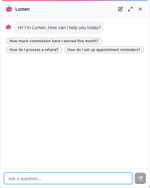 The opened Lumen widget showing the greeting and a row of suggestion chips above the message input