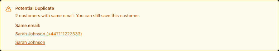 The amber Potential Duplicate panel on the Add Customer form, reading